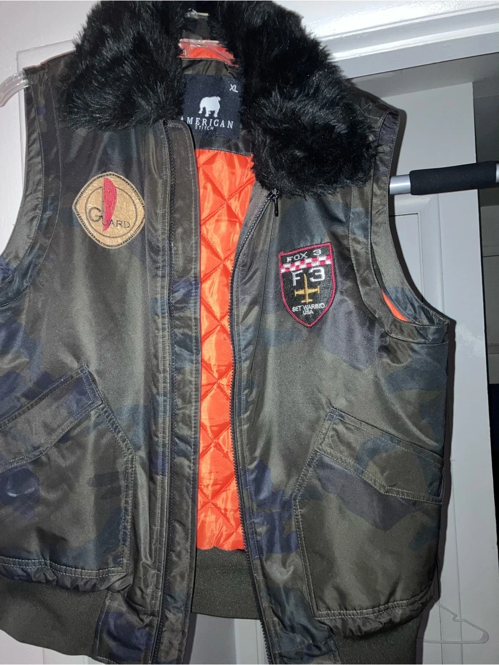 American Stitch Men's Camo Bomber Vest with Orange Lining and Black Fur Collar